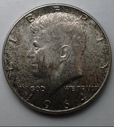 1964-Kennedy-50-Cent.-Whats-The-Black-All-Over-It-?